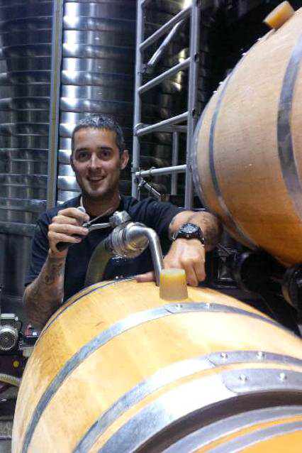 Grand Cru Experience, pumping the white wine out of the barrel